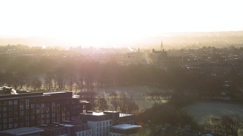 Establishing Aerial View Shot of Edinburgh UK, Scotland United Kingdom, morning rays