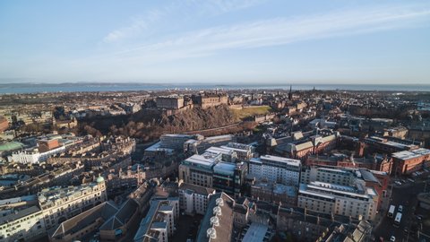 Establishing Aerial View Shot of Edinburgh UK, Scotland United Kingdom, day, Edinburgh Castle, fairly wide