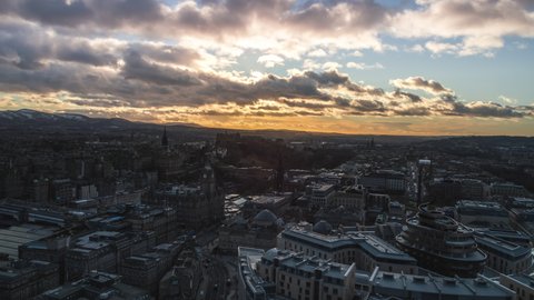Establishing Aerial View Shot of Edinburgh UK, Scotland United Kingdom, last rays of sun over old town