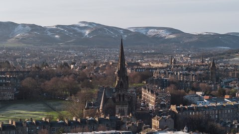 Establishing Aerial View Shot of Edinburgh UK, Scotland United Kingdom, stunning church, magnificent skyline