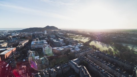 Establishing Aerial View Shot of Edinburgh UK, Scotland United Kingdom, groovy light welcomes city