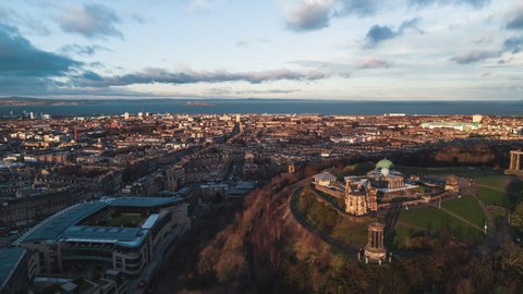 Establishing Aerial View Shot of Edinburgh UK, Scotland United Kingdom, delicious view in last rays of sun