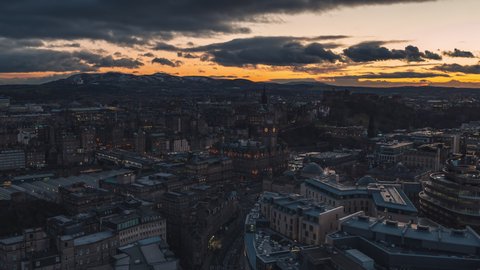 Establishing Aerial View Shot of Edinburgh UK, Scotland United Kingdom, darknes covers town