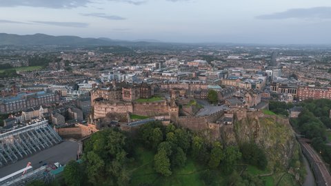 Establishing Aerial View Shot of Edinburgh UK, Scotland United Kingdom, Castle day, early