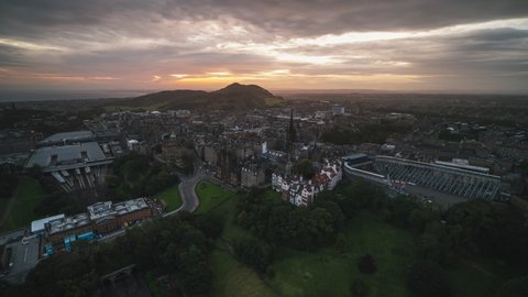 Establishing Aerial View Shot of Edinburgh UK, Scotland United Kingdom, staggering sky 
