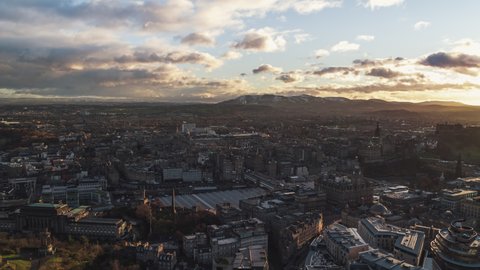 Establishing Aerial View Shot of Edinburgh UK, Scotland United Kingdom, late afterenoon