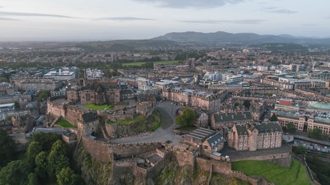 Establishing Aerial View Shot of Edinburgh UK, Scotland United Kingdom, castle overcast