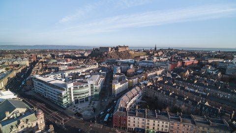 Establishing Aerial View Shot of Edinburgh UK, Scotland United Kingdom, super wide, city center and Edinburgh Castle