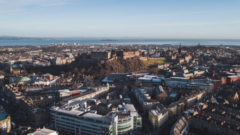 Establishing Aerial View Shot of Edinburgh UK, Scotland United Kingdom, day, phenomenal Edinburgh Castle