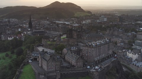 Establishing Aerial View Shot of Edinburgh UK, Scotland United Kingdom, hazy morning