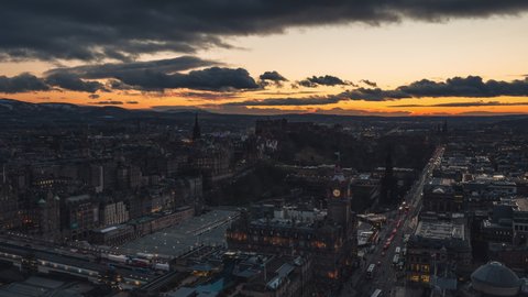 Establishing Aerial View Shot of Edinburgh UK, Scotland United Kingdom, early evening in town