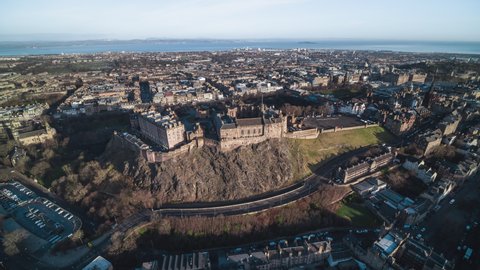 Establishing Aerial View Shot of Edinburgh UK, Scotland United Kingdom, day, castle and old town