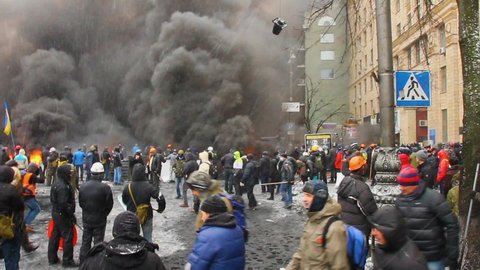 Ukraine, Kiev, 22 January 2014: a clash of radical Protestants Maidan right sector with riot police forces of Yanukovych in the street Grushevskogo - the conflict moved to the street fighting