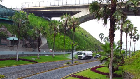 Lima, Peru - 07th Mar 2022: Tanker truck from the municipality of Miraflores is watering the plants in the Balta descent, Lima. Peru
