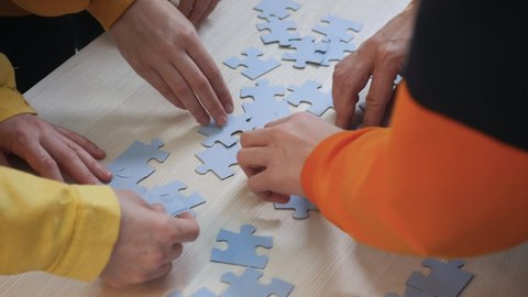 Teamwork concept. a group of people a team assemble jigsaw puzzles solve a problem. Business teamwork concept. community of people together put the puzzles. Business solution partnership. support
