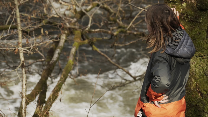 Scottish Forest - Boy looks at rushing river