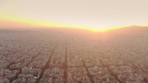 Aerial Panoramic View Of Barcelona City Skyline And Urban Octagon Buildings, Barcelona Spain At Sunset