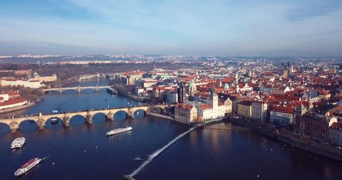 Footage of the Aerial View to the Charles Bridge that crosses the Vltava river in Prague, Czech Republic