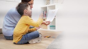 Child Therapist helping kid to understand family problem using drawing picture of his parents. Children mental health therapy - Powered by Shutterstock - Get 15% off with code: PIKWIZARD15
