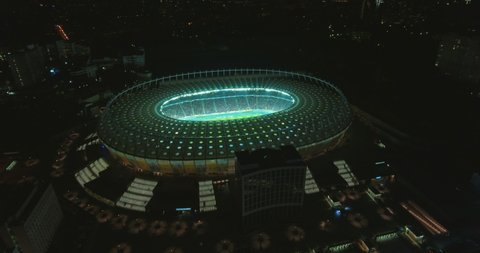 aerial survey. Kiev-Olympic Stadium October 9, 2017. World Cup. Ukraine-Croatia. cityscape time of day night. The view from the top to the illuminated stadium with games and fans. 