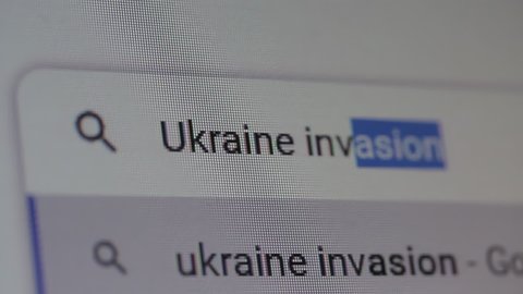 New York, United States - March 2022: Searching for "Ukraine Invasion" on the Internet. Close Up. 