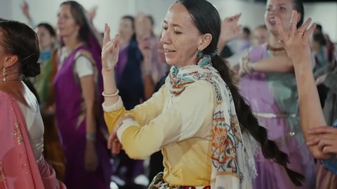 Lermontovo, Russia - September 5, 2021: Hare Krishna women singing and dancing