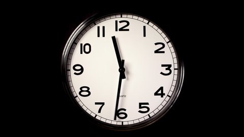Unbranded modern clock covering 14 hours in timelapse, motion blur