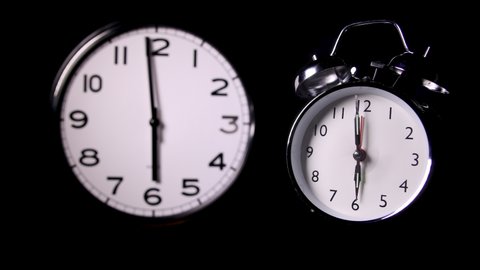 One modern and one traditional alarm clock covering 6 hours up to 12 o clock