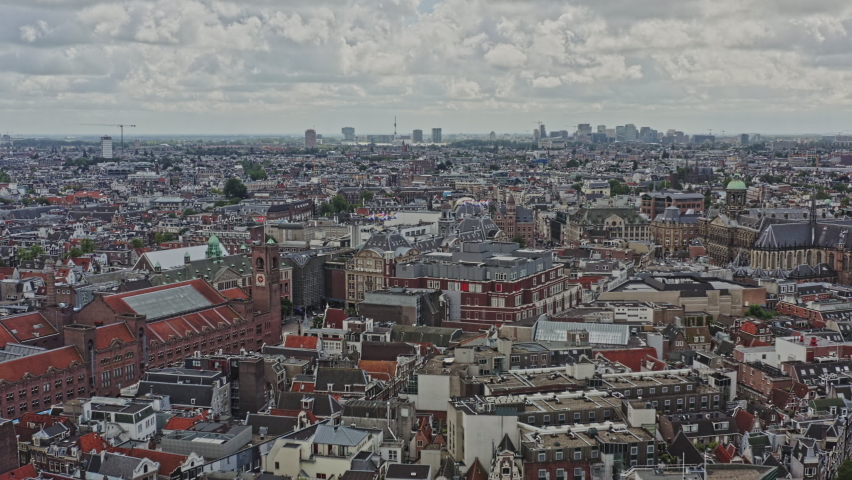 Amsterdam Netherlands Aerial v10 drone fly across binnenstad and grachtengordel neighborhoods towards the horizon capturing historic downtown cityscape - August 2021