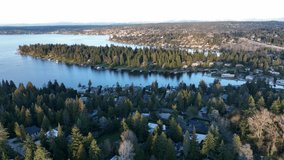 Cinematic 4K aerial drone trucking clip of Medina, Hunts Point, Yarrow Point, Clyde Hill, Evergreen Pt floating bridge, Lake Washington mansions, luxury homes, villas