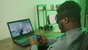 black man gaming with VR headset blur - close-up shot. High quality 4k footage