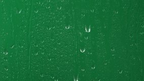 Water rainfall, rain drops falling on window glass over chroma key green screen - Powered by Shutterstock - Get 15% off with code: PIKWIZARD15