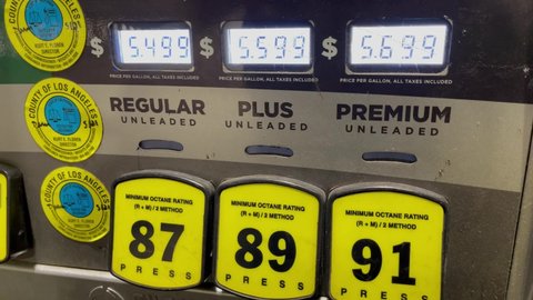 LOS ANGELES, March 11th, 2022: High gas prices. Close up of pump at a gas station, displaying prices of nearly six dollars a gallon.