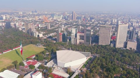 MEXICO CITY, MEXICO, NORTH AMERICA - CIRCA 2020: Aerial view of capital of Mexico, Auditorio Nacional in park Bosque de Chapultepec, skyline with modern high-rise buildings (skyscrapers) - landscape