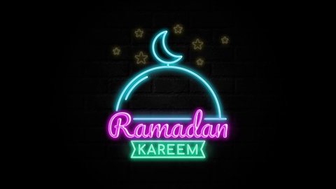 Ramadan neon sign on a brick wall
