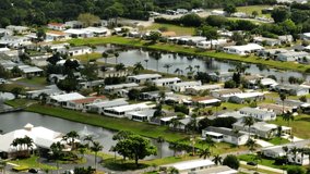 Mobile home trailer park Fort Pierce Florida. 4k 7x zoom aerial video