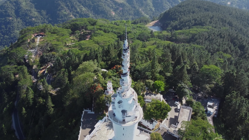 The most unusual temple. Tower with spiral staircase. Ambuluwawa Biodiversity Complex - The main attractions of Sri Lanka. Aerial 4K