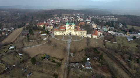 Aerial forwarding shot of Basilica of the Visitation of the Virgin Mary, Olomouc on the Svaty Kopecek church in Czech Republic, Europe. Beautifully decorated of Baroque architecture landmark.