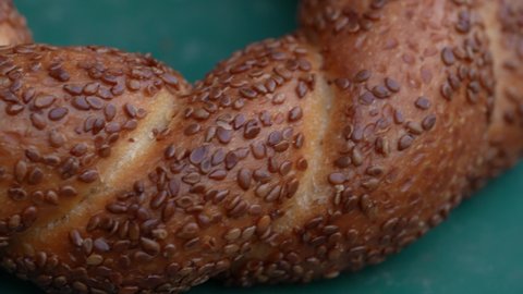 Close up macro shot of Turkish bagel, crispy. Breakfast food with sesame, pastry crunchy concept.