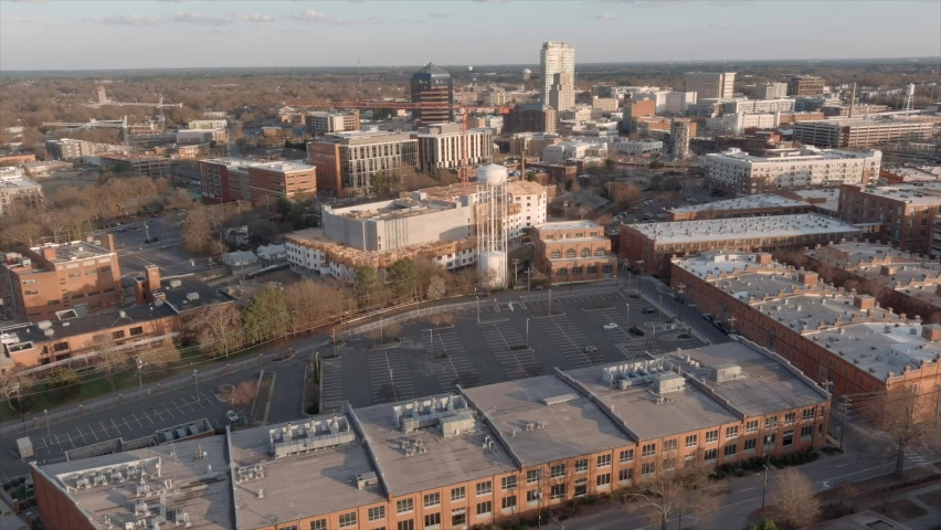 Establishing shot of Durham downtown in North Carolina, USA. Aerial forward Royalty-Free Stock Footage #1088303665