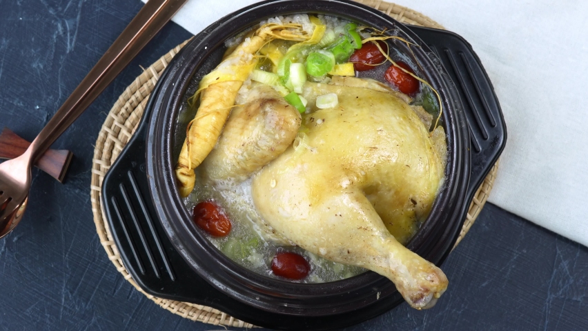 
Ginseng chicken soup or Samgyetang, Koreans traditional food chicken stuffed with rice, ginsenga popular stamina food in summer. Royalty-Free Stock Footage #1088305529