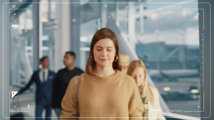 Caucasian Female Proceeds Through Automated Passport Border Control with Identity Face Recognition Scanner at International Airport. Footage Showing Biometric Facial Recognition Scanning Process. Royalty-Free Stock Footage #1088317945