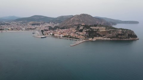 Aerial view of medieval castle and Arvanitia beach in Nafplio, Peloponesse, Greece. Summer travel