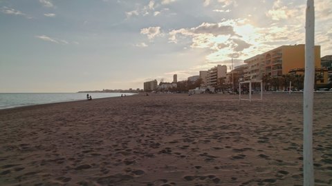 Benalmadena aerial beach dolly at sunset, south of Spain