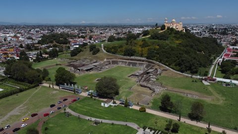 The cathedral and the pyramids from above in Cholula, Mexico