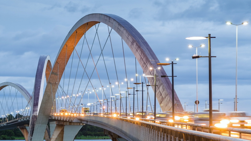 Time lapse view of rush hour traffic on JK Bridge in Brasilia, Federal District, capital of Brazil, zoom out.