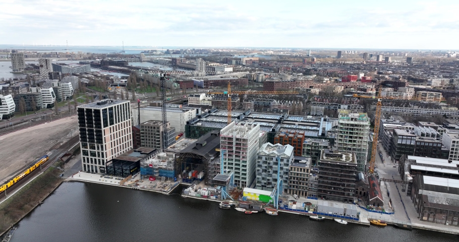Amsterdam, 6th of March 2022, The Netherlands. Modern apartment constuction site residential housing Oostenburg, city district. Oostelijke Eilanden along the Ij.