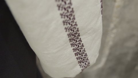 macro filmed details from a traditional hand - embroidered peasant blouse - ie Romanian