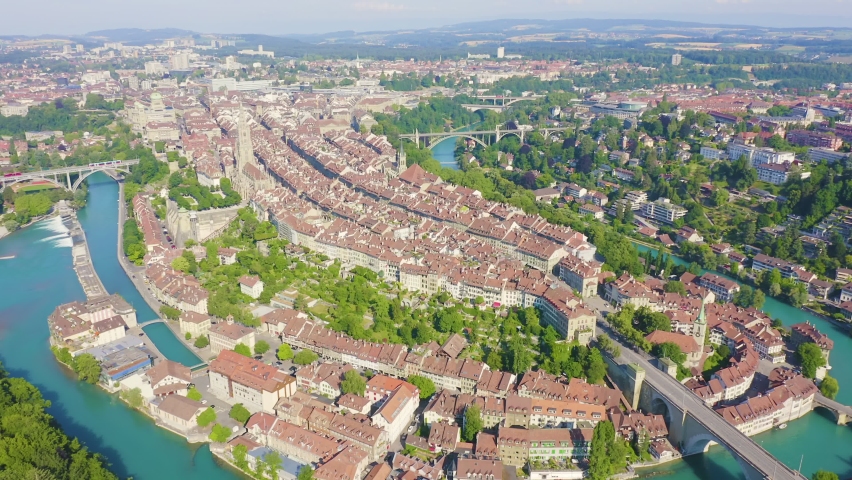 Inscription on video. Bern, Switzerland. Historic city center, general view, Aare river. Knitted texture inscription, Aerial View