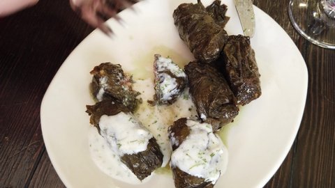 Person's point of view. The first perspective, eating dolma.